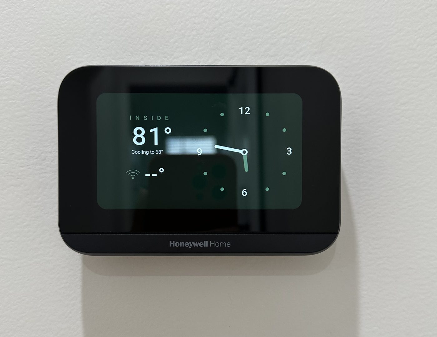 Honeywell Home smart thermostat showing the A/C cooling at 1148 S Rimpau Blvd